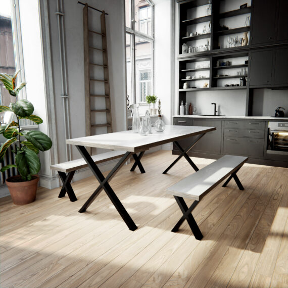 Image d'ambiance d'un groupe de tables à manger dans une cuisine avec des pieds en forme de X en noir