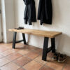 Oak bench in a hallway with black A-shaped table legs, 30/45 × 42 cm